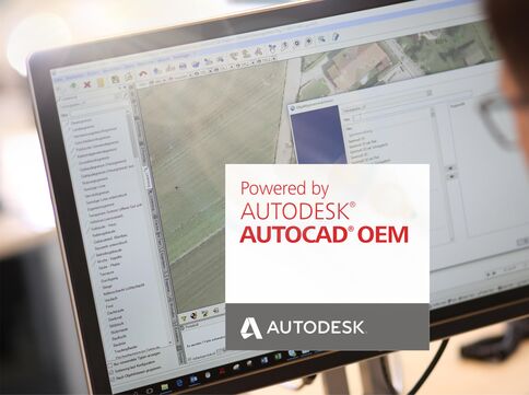 Ein Computerbildschirm zeigt die AutoCAD-Oberfläche mit Kartenausschnitt und Werkzeugleisten; im Vordergrund befindet sich ein Logotext „Powered by AUTODESK AUTOCAD OEM“.