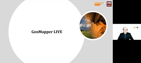 Slide GeoMapper LIVE sur fond gris avec un grand cercle blanc portant le titre; une vignette circulaire montre une image géographique et une fenêtre vidéo présente le présentateur.