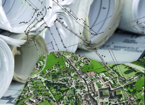 Carte urbaine déployée sur des plans roulés et des documents imprimés; on distingue un quartier et des zones vertes, avec une superposition de lignes et de points évoquant un tracé géographique ou un schéma d’urbanisme.